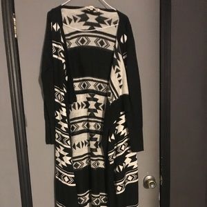 Floor length black and white cardigan.
